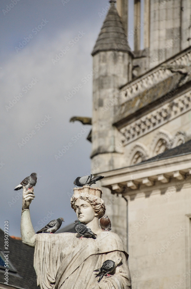 Statue of a woman on one of the central squares of Nantes, France