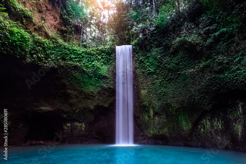 Just one of the many hidden gems this tropical island has to offer,Tibumana waterfall, Bali Indonesia. photo