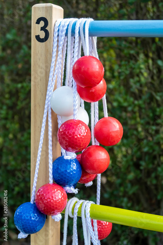 Game of ladder golf set up outdoors in a garden
