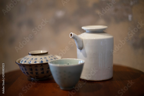 Chinese vintage tea set on the retro table as background