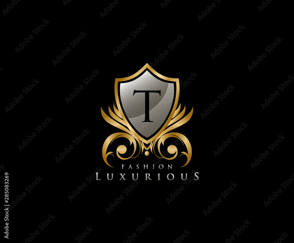 Luxury Golden Shield Logo with T Letter, royal shield logo icon. Luxury Golden Shield Logo with T Letter, royal shield logo icon.