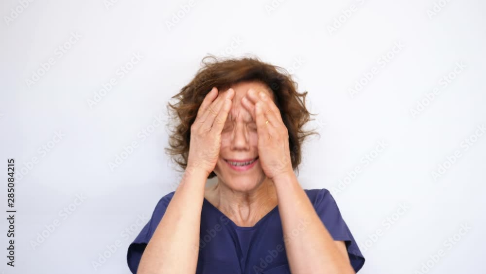 Mature woman gesturing failure and problems Isolated on white background. Shot in 4K Mature woman gesturing failure and problems Isolated on white background. Shot in 4K
