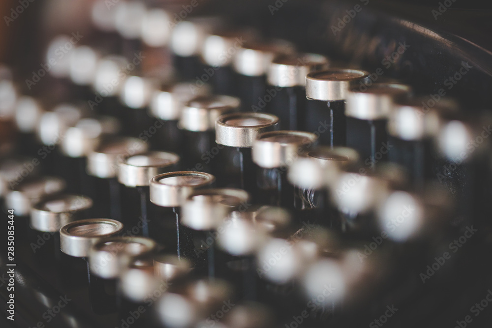 Close up image of the keys on an old vintage typewriter Close up image of the keys on an old vintage typewriter