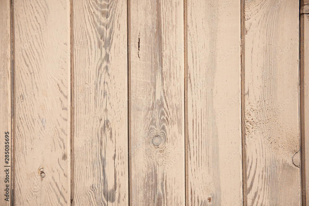Background texture of old beige painted wooden lining boards wall Background texture of old beige painted wooden lining boards wall
