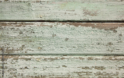 Background texture of old blue painted wooden lining boards wall