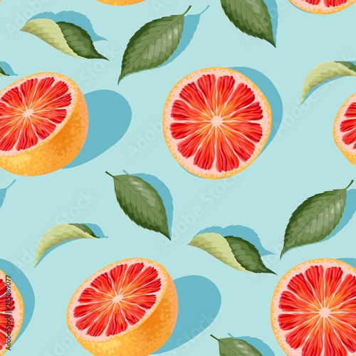 Seamless pattern with grapefruit slices and leaves