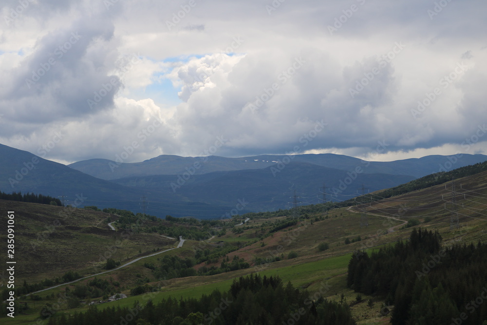 scotland landscape with mountains and clouds