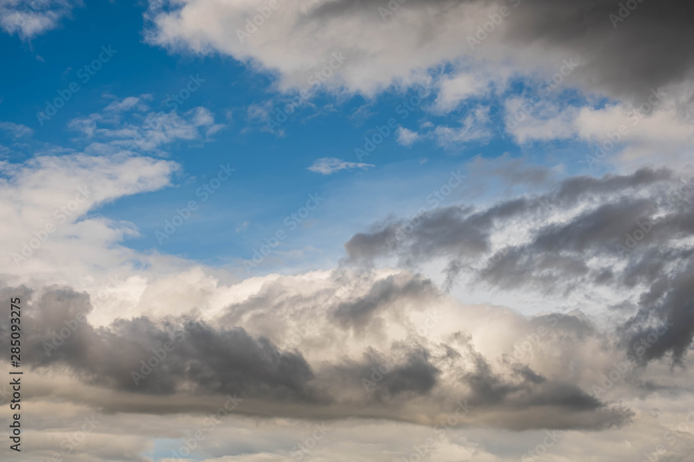 Clouds near sunset before rain blue sky Clouds near sunset before rain blue sky