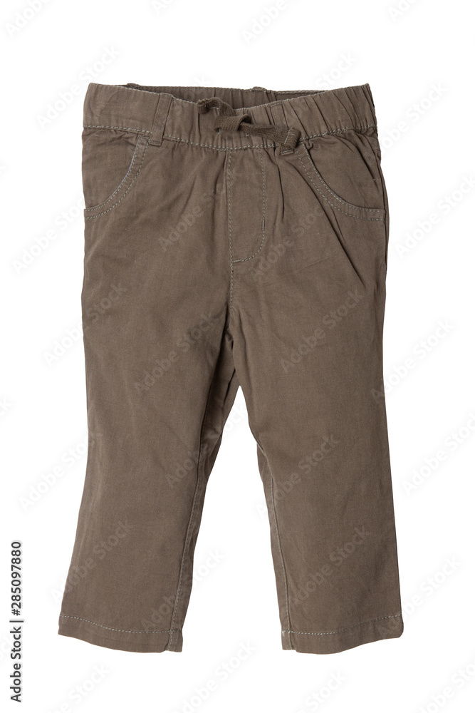 Children pants isolated. Closeup of khaki denim pants isolated on a white background. Sporty fashion for kids. Children pants isolated. Closeup of khaki denim pants isolated on a white background. Sporty fashion for kids.