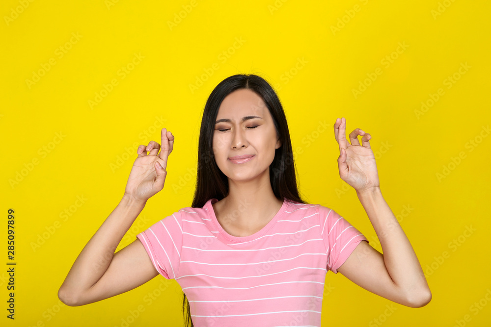 Beautiful young woman on yellow background Beautiful young woman on yellow background