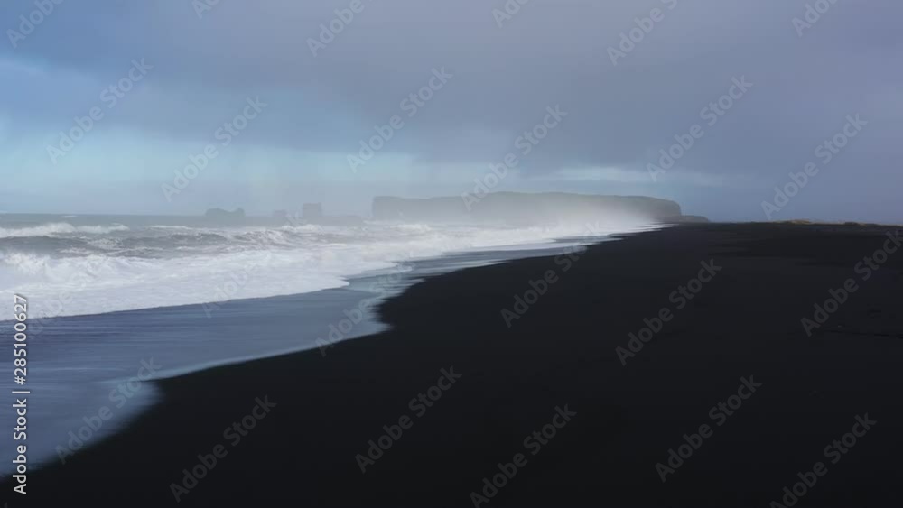 Ocean waves on the black beach of Iceland aerial Ocean waves on the black beach of Iceland aerial