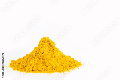 Pile of yellow curry seasoning isolated