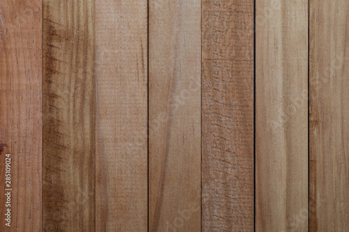 Texture of natural wood slats (unvarnished). Copper, reddish, cherry. Vertical sense.