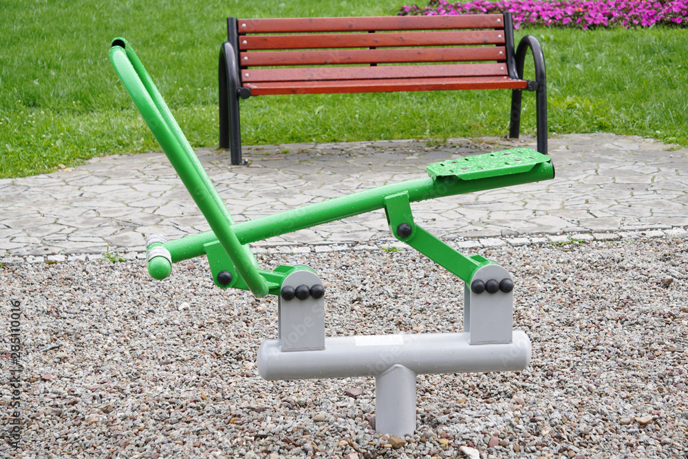 outdoor green-gray iron exercise machine for sports. public gym, muscle building, exercise outdoor green-gray iron exercise machine for sports. public gym, muscle building, exercise