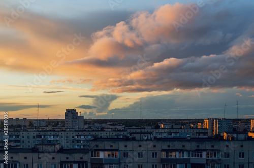 Beautiful clouds during sunset over the city, cityscape © andrei310