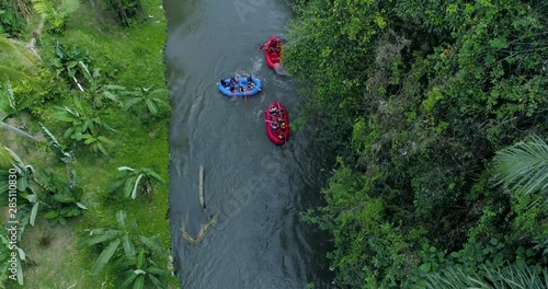 Aerial view three rafting boat on jungle river