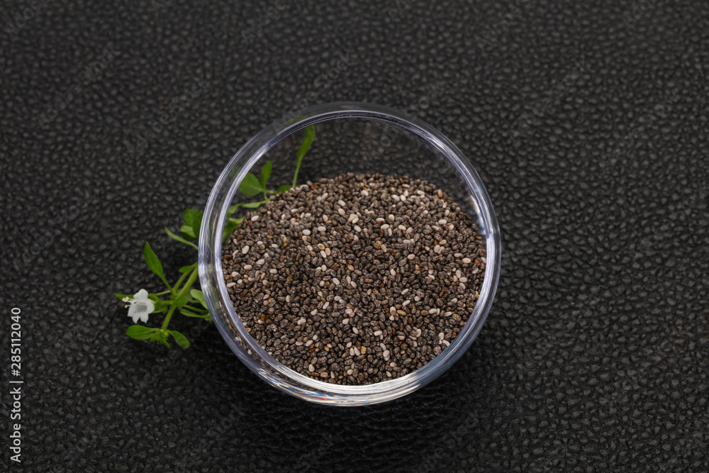 Dietary Chia seeds in the bowl Dietary Chia seeds in the bowl