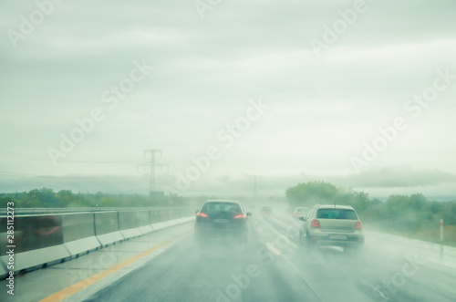 misty road during rainy day