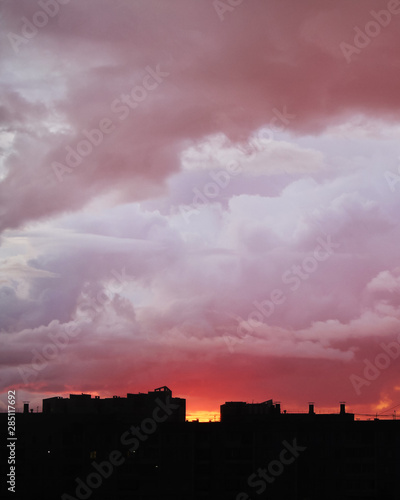 a beautiful sunset with big red coloured clouds