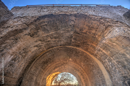фотографія arched concrete tunnel under railroad overpass, Matfield Green, Kansas