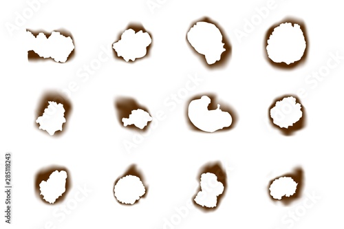 Collection burnt paper holes on white background. Burned scorched holes set