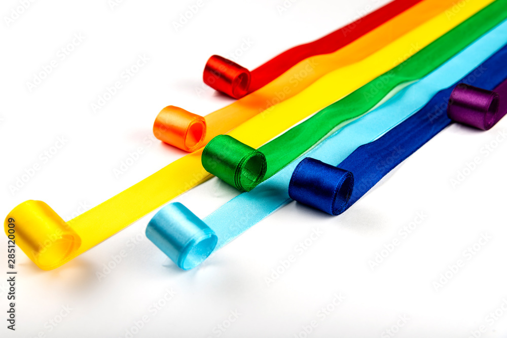 LGBT flag, rainbow symbol of sexual minorities in the form of satin ribbons. Stop homophobia LGBT flag, rainbow symbol of sexual minorities in the form of satin ribbons. Stop homophobia