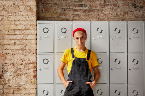 Portrait Of Confident Male With Hands In Pockets photo