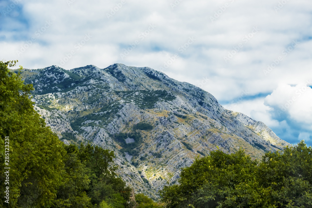 Beautiful mountain landscape on sunny summer day. Montenegro, Albania, Bosnia,  Dinaric Alps Balkan Peninsula. Сan be used for postcards, banners, posters, posters, flyers, cards.