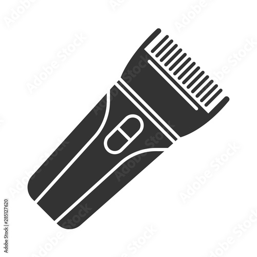 Hair clipper glyph icon. Electric hair trimmer. Haircutting machine. Implement for making short haircut. Professional man hairstyling. Silhouette symbol. Negative space. Vector isolated illustration