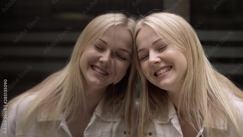 Portrait of a beautiful smiling young blue-eyed blonde girl Portrait of a beautiful smiling young blue-eyed blonde girl