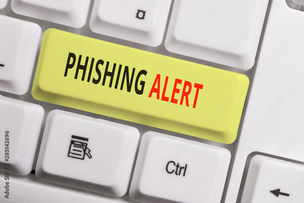 Text sign showing Phishing Alert. Business photo showcasing aware to fraudulent attempt to obtain sensitive information White pc keyboard with empty note paper above white background key copy space