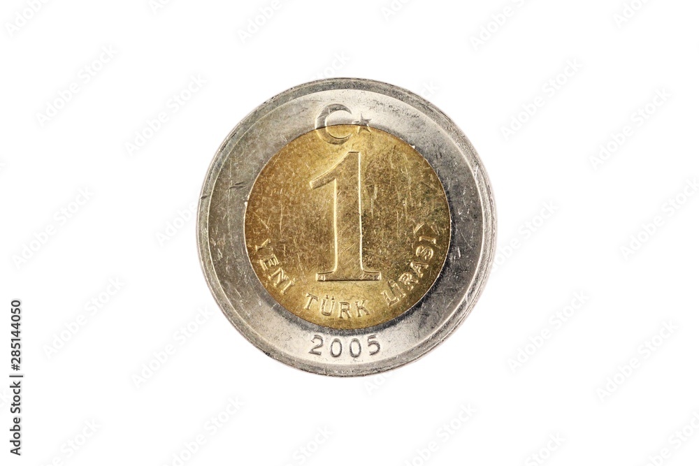 A bimettalic Turkish one lira coin isolated on a white background, shot in close up macro A bimettalic Turkish one lira coin isolated on a white background, shot in close up macro