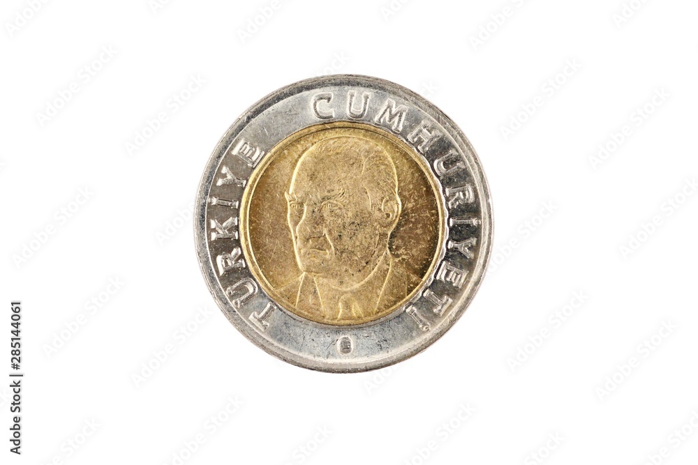 A bimettalic Turkish one lira coin isolated on a white background, shot in close up macro A bimettalic Turkish one lira coin isolated on a white background, shot in close up macro