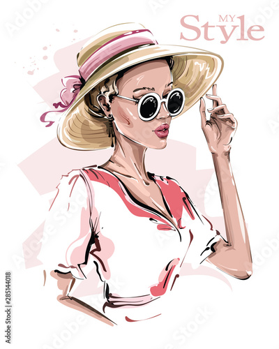 Hand drawn beautiful young woman in hat. Stylish girl in sunglasses. Fashion woman look. Sketch. Vector illustration.