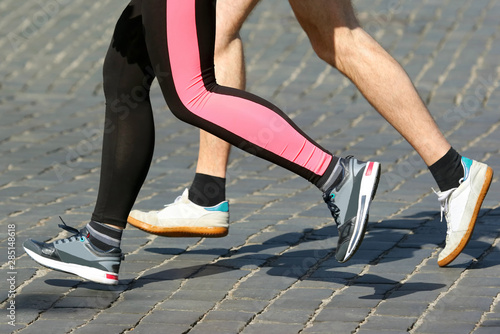 athletes run marathons on the pavement. sport and health.