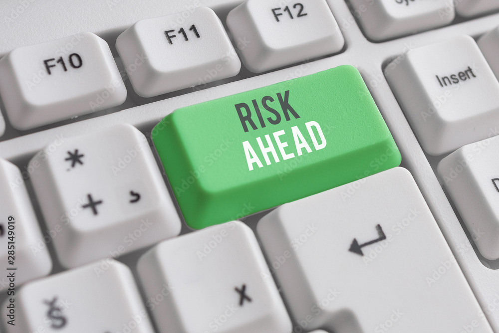 Handwriting text writing Risk Ahead. Conceptual photo A probability or threat of damage, injury, liability, loss White pc keyboard with empty note paper above white background key copy space Handwriting text writing Risk Ahead. Conceptual photo A probability or threat of damage, injury, liability, loss White pc keyboard with empty note paper above white background key copy space
