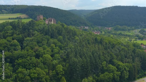 Aerial view of the  village and castle Gamburg in Germany. Zoom out from the hill. photo