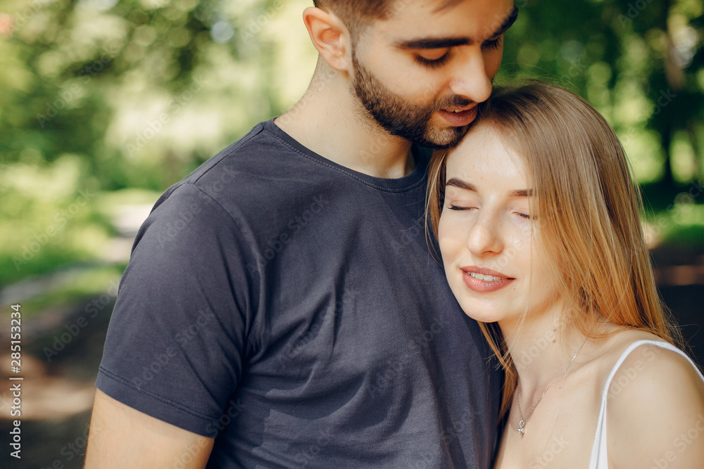 Couple in a forest. Beautiful blonde with her boyfriend Couple in a forest. Beautiful blonde with her boyfriend