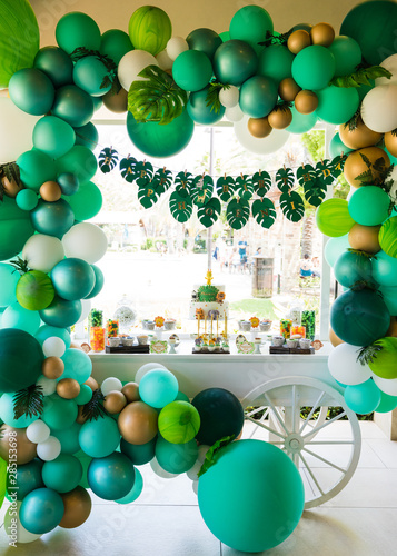 children's birthday party balloon and cake arrangements