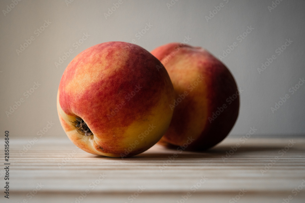 Close-up of a Peach on a Cutting Board Close-up of a Peach on a Cutting Board