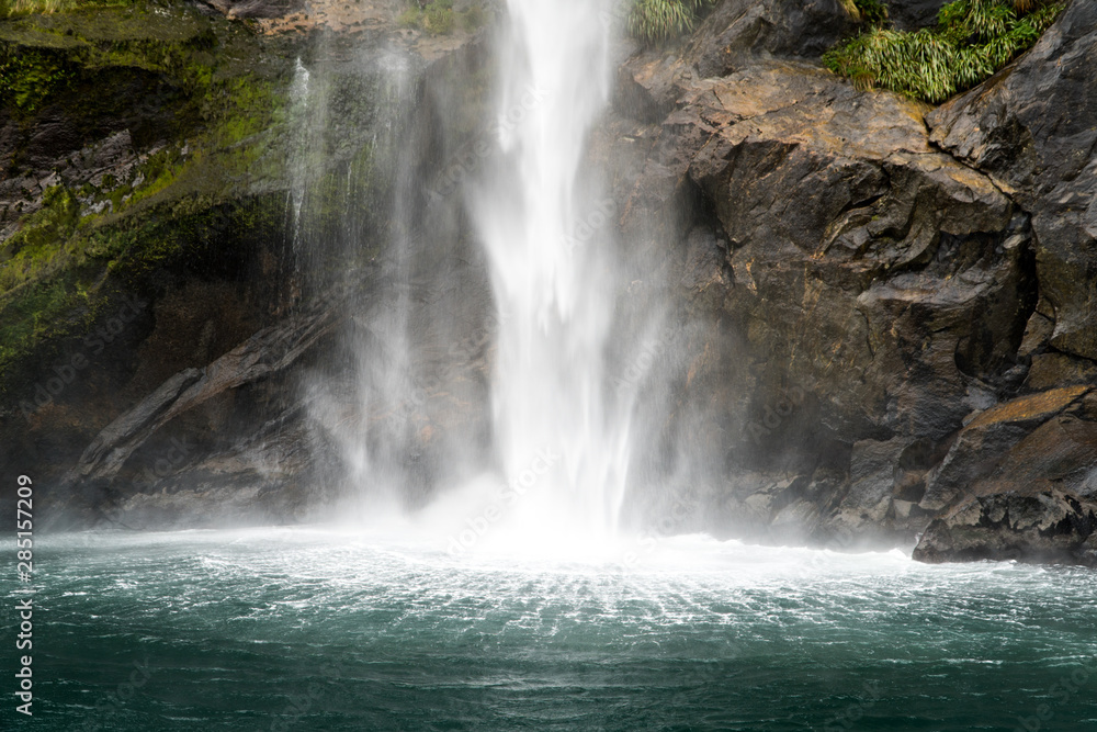 Fototapeta premium Waterfall splash in Milford Sound