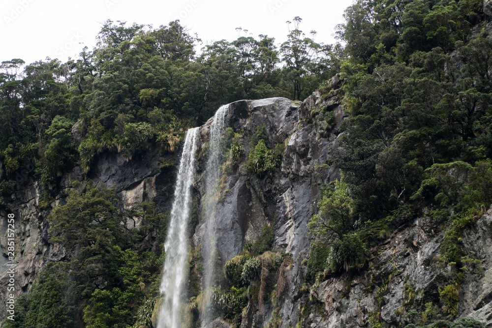 water flowing over rocks in Milford Sound water flowing over rocks in Milford Sound