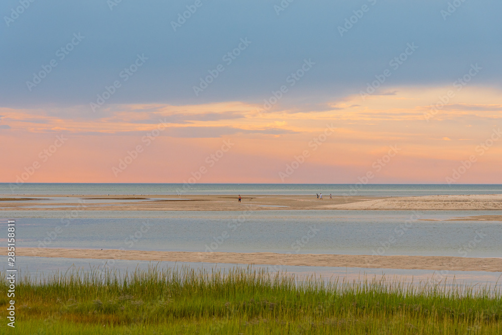 Vacationing Tourists Enjoy the Cape Cod Bay under a Pastoral Pastel August Sunset