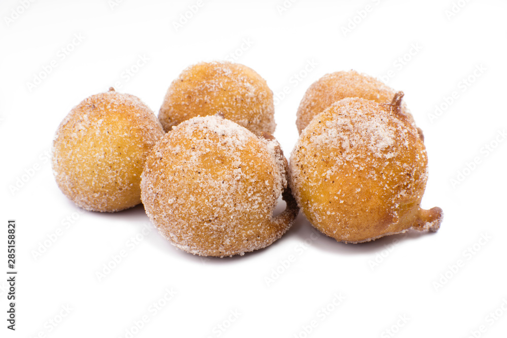 Traditional Brazilian mini fried cakes called bolinho de chuva isolated in white background Traditional Brazilian mini fried cakes called bolinho de chuva isolated in white background