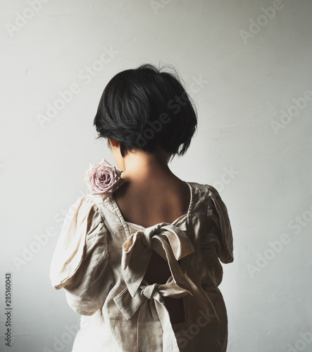 a girl with a  rose