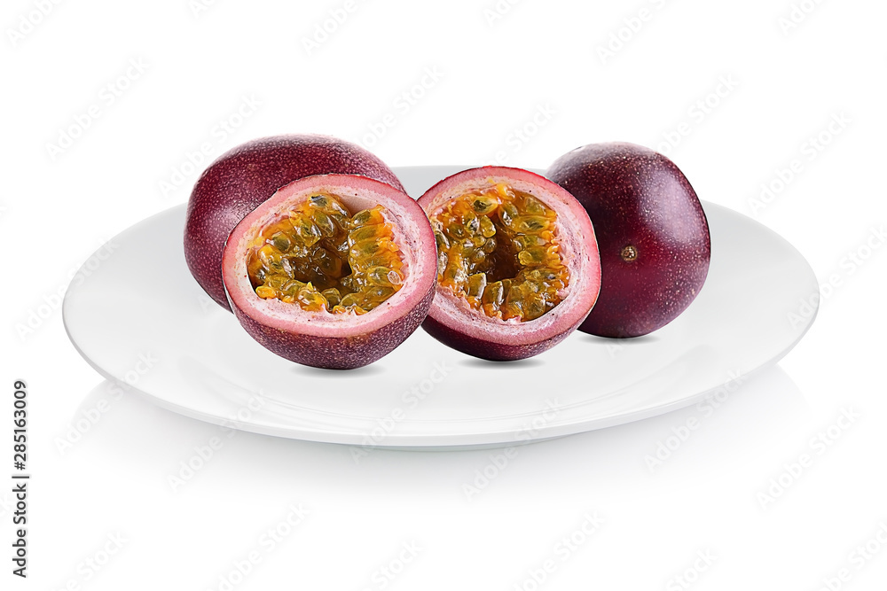 Passion fruit isolated on white plate Passion fruit isolated on white plate