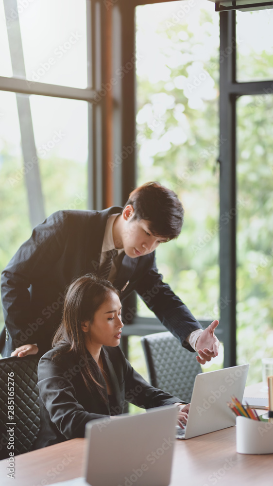 Professional business partner exchanging the idea together Professional business partner exchanging the idea together