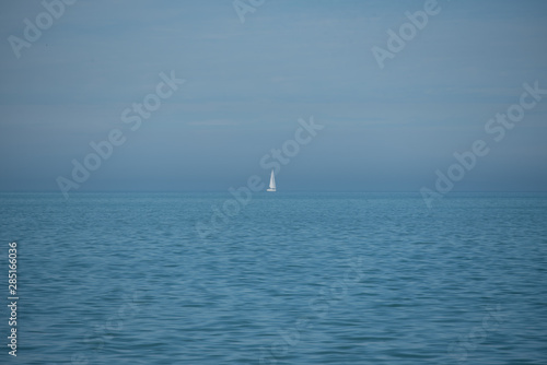 sail boat in distance © Landon