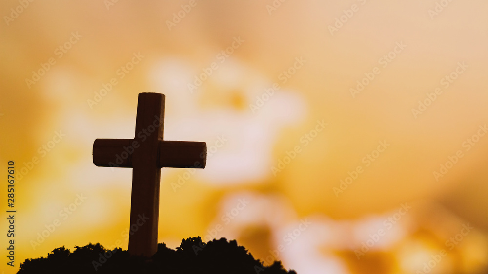 Silhouette cross on mountain at sunset background.Crucifixion Of Jesus Christ Silhouette cross on mountain at sunset background.Crucifixion Of Jesus Christ