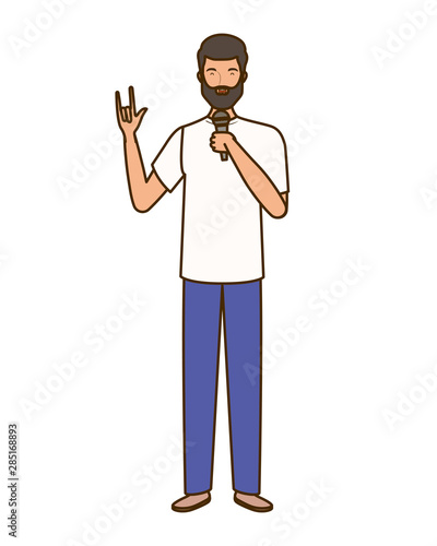 young man with microphone on white background photo